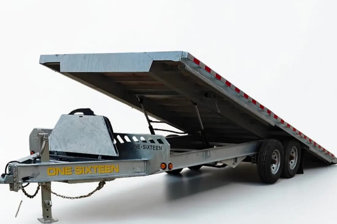 Galvanized bumper pull deckover trailer with the power tilt deck raised
