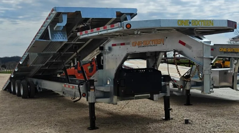 One Sixteen gooseneck tilt-deck trailers with decks raised
