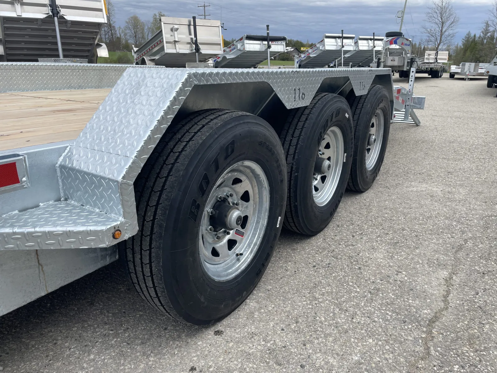 Three galvanized 7K axles with checker plate fenders